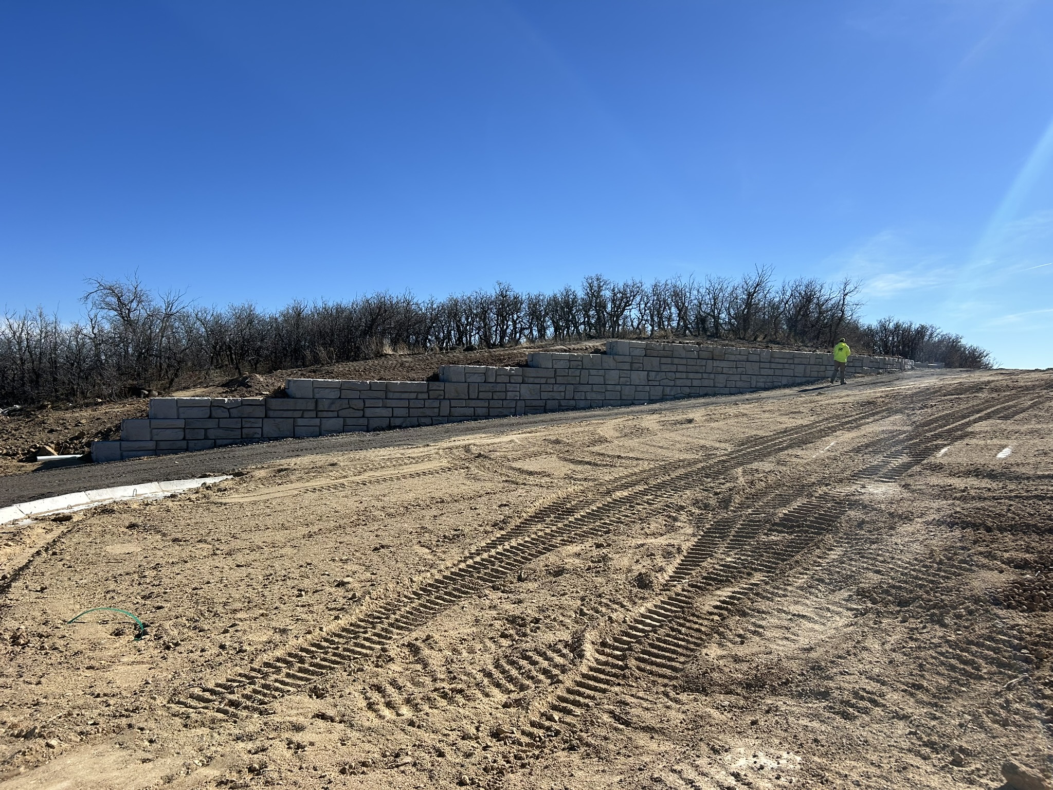 Retaining wall and site grading by Freedom Ranch Excavating in Peyton, Colorado