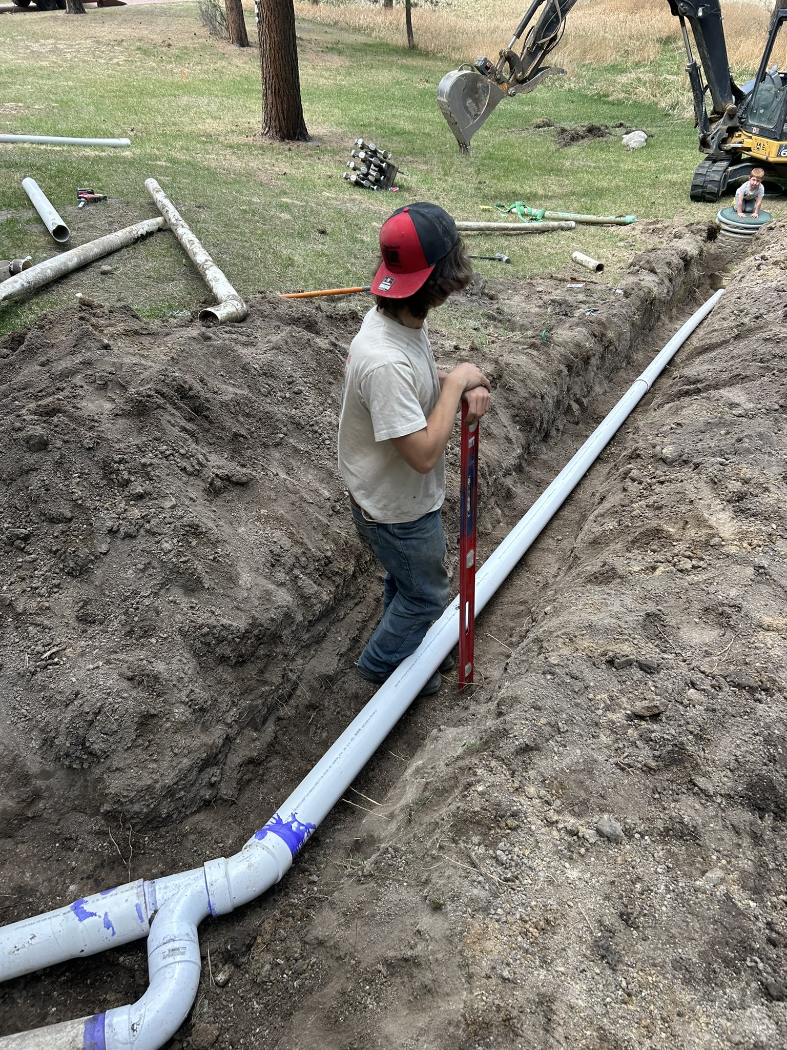 Utility line trenching and repair by Freedom Ranch Excavating in Peyton, Colorado