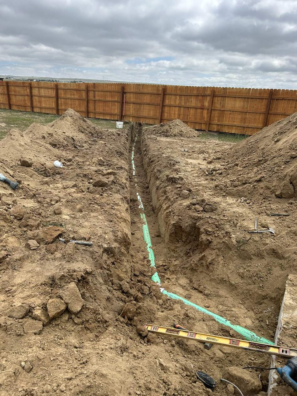 Utility line trenching and repair by Freedom Ranch Excavating in Peyton, Colorado